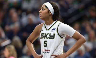 Chicago Sky forward Angel Reese looks on during a game.