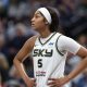 Chicago Sky forward Angel Reese looks on during a game.