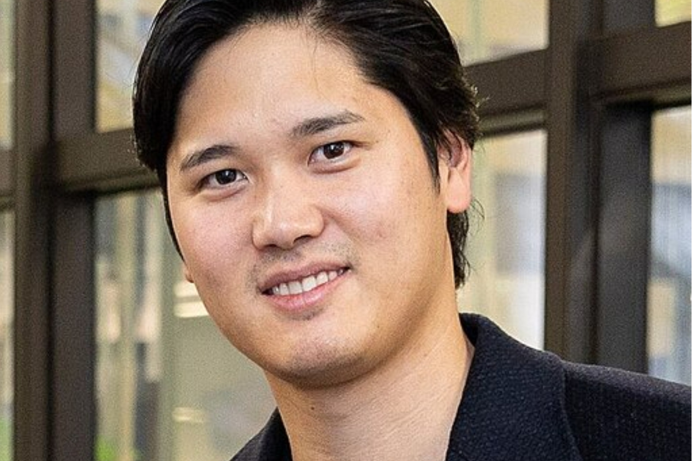 Los Angeles Dodgers star Shohei Ohtani posing for a photo.