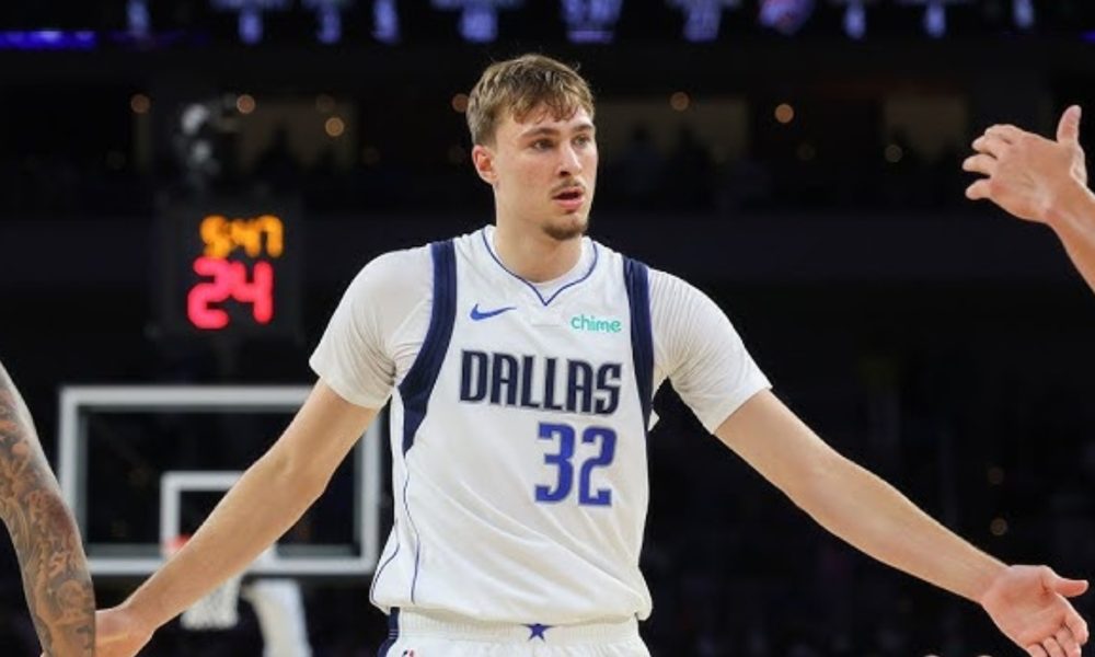 Dallas Mavericks rookie Cooper Flagg reacts during a game.