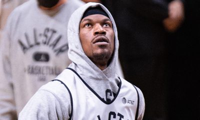 Golden State Warriors star Jimmy Butler looks on during a game.
