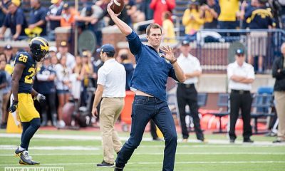 Tom Brady plays catch with Head Coach Jim Harbaugh before Michigan's 45-28 victory over Colorado on September 17, 2016. (James Coller/Maize and Blue Nation)