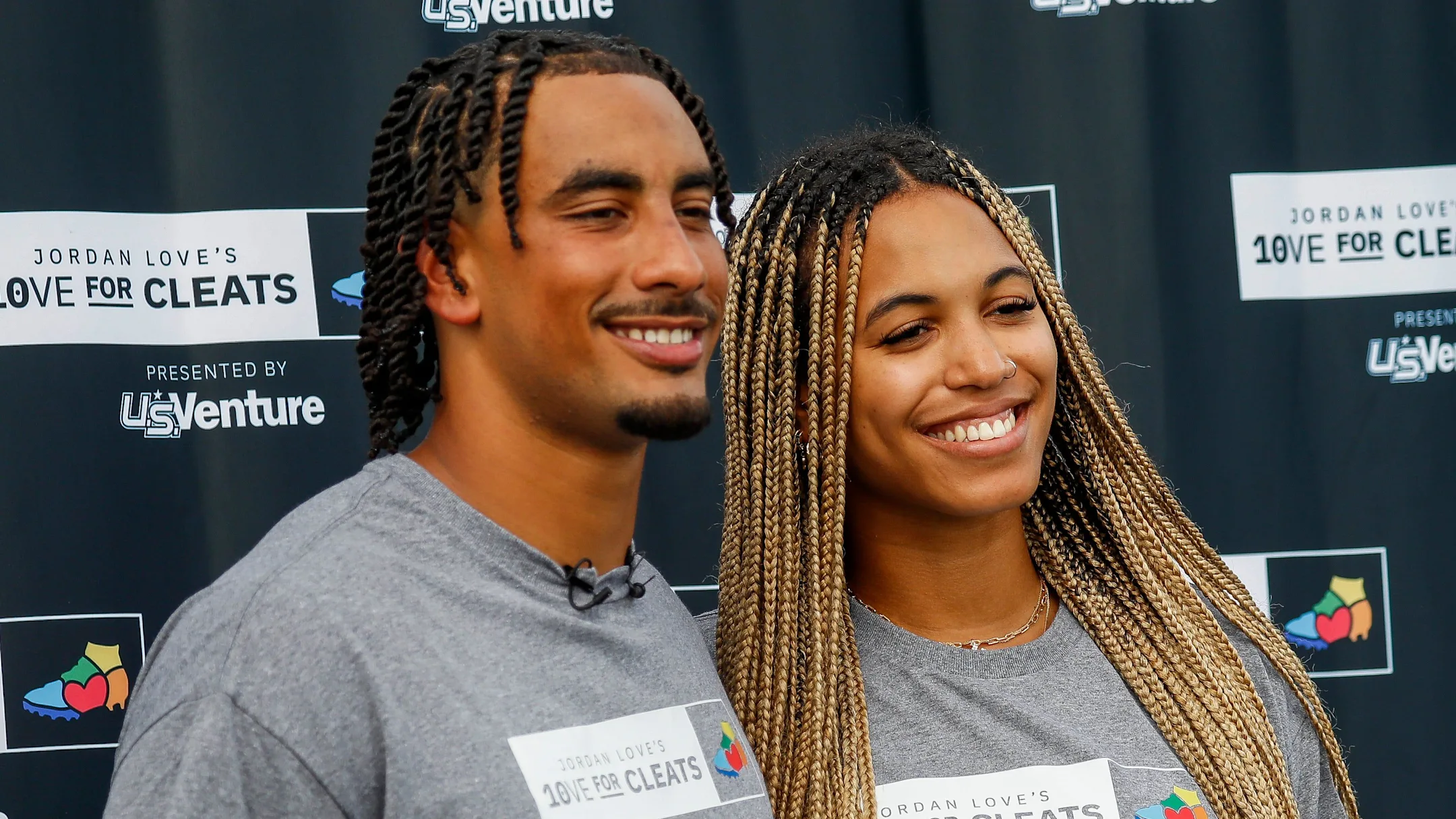 Green Bay Packers quarterback Jordan Love and his fiancée, Ronika Stone, pose for a photo during a charity event with Love’s foundation, Hands of 10ve. | Tork Mason / USA TODAY NETWORK